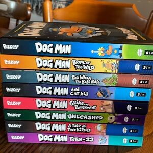 8 hardcover Dog Man books